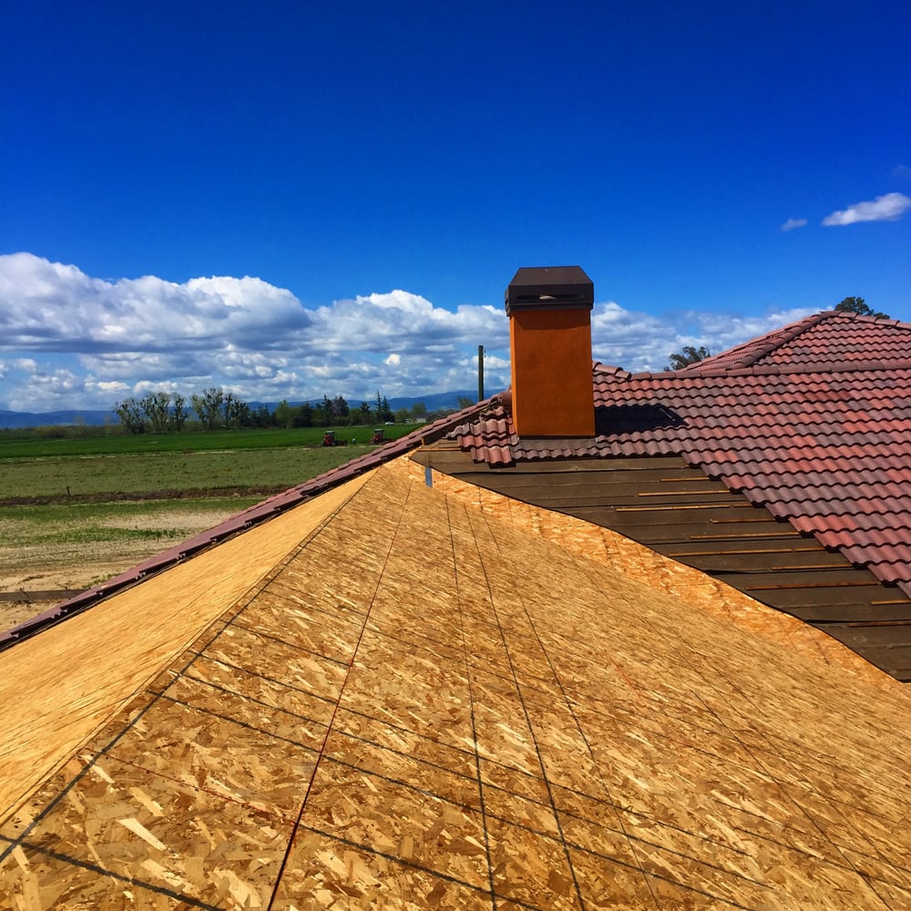 Spanish Colonial home in Newman, CA — typical roofing project for DeHart Roofing